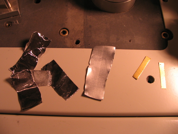 Soda/beer cans, brass, copper, aluminum sheet goods all will make acceptable shims